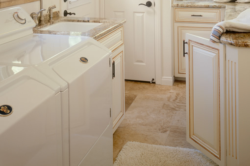 Bathroom Cabinets with White Paint with Glaze Raised Panel Doors Rope Molding Rope Detail on Doors