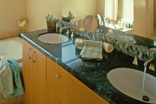 Alder Bathroom Cabinets with Bookmatched Aires Doors Double Sink